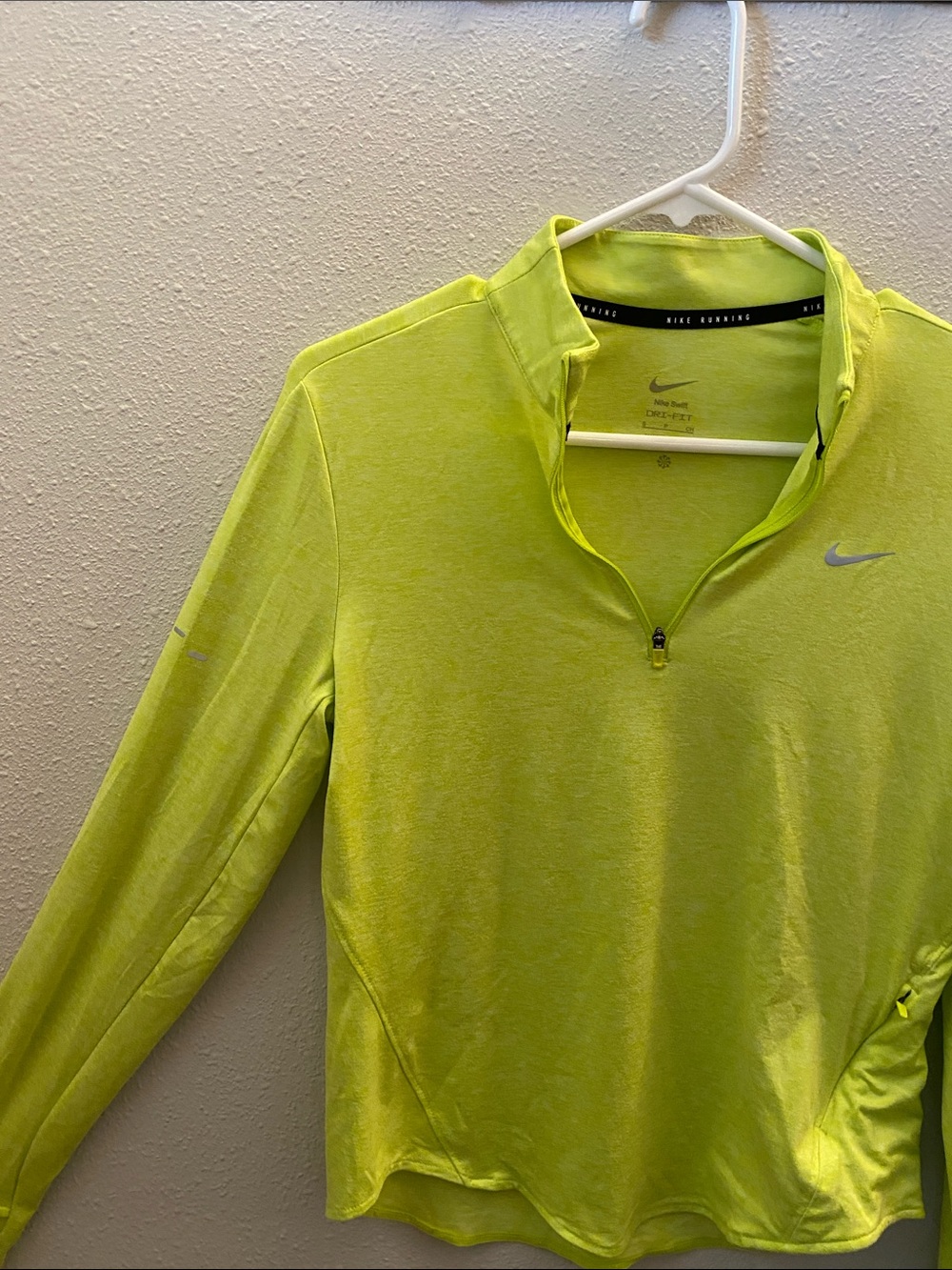 Nike woman’s High-Visibility Yellow-Green Quarter-Zip Running Top